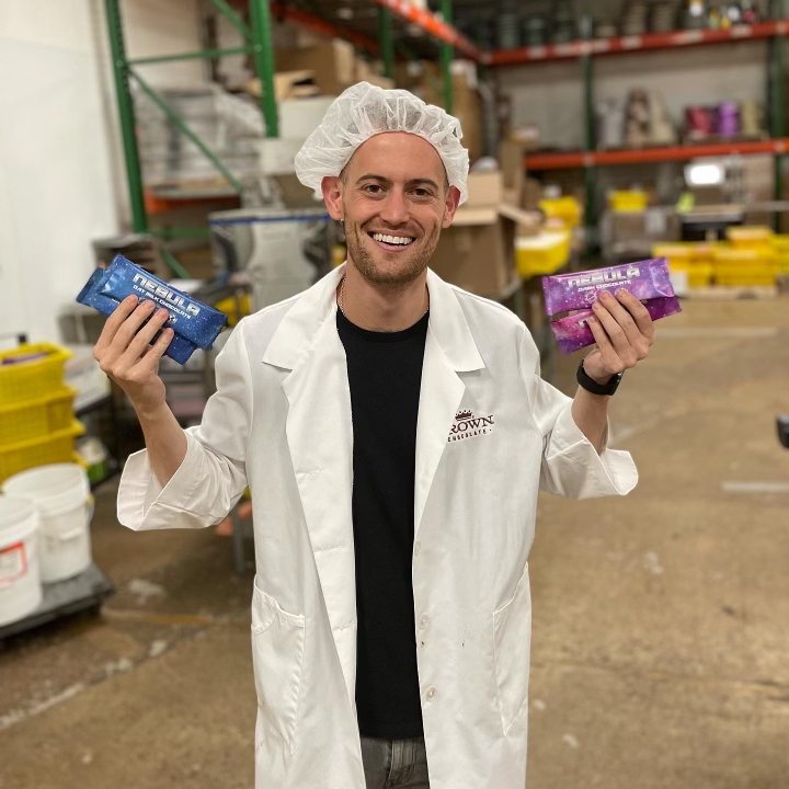 David at the factory holding the first Nebula chocolate bars
